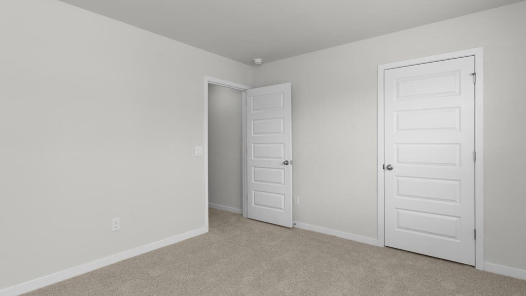 Spacious, unfurnished interior of a new home in Cedar Hill Landing, Navassa (Image 36). Spacious, unfurnished interior of a new home in Cedar Hill Landing, Navassa (Image 36).