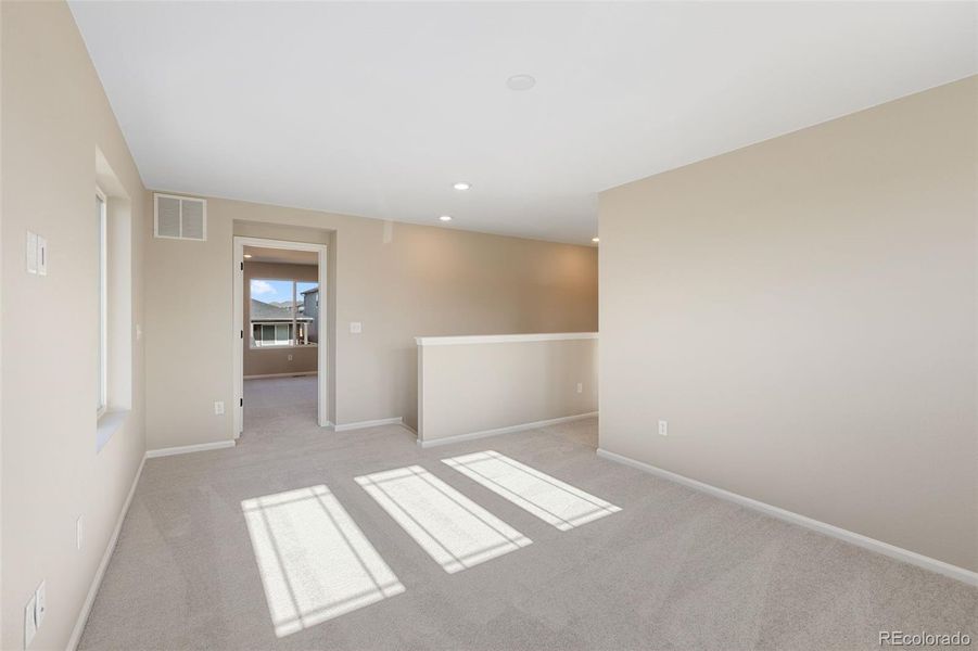 Spacious, unfurnished interior of a new home in The Cottages Collection at Ridgeline Vista, Brighton (Image 22).