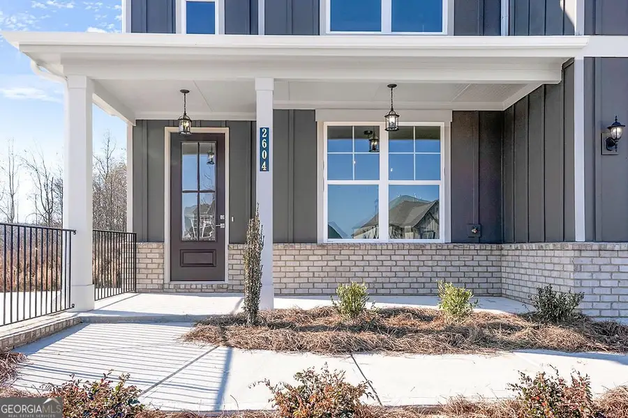 Exterior details and patio area of a home in The Manor at Gainesville Township, Gainesville (Image 3).