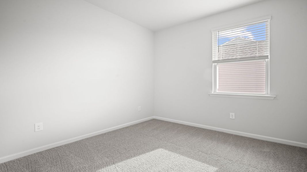 Spacious, unfurnished interior of a new home in The Retreat at East Argent, Ridgeland (Image 22).