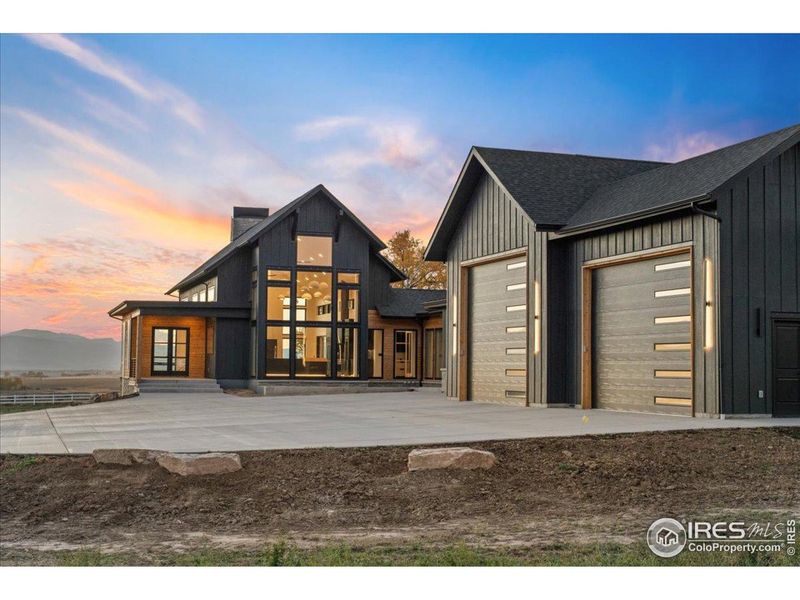 Notice the extra concrete + large attached shop