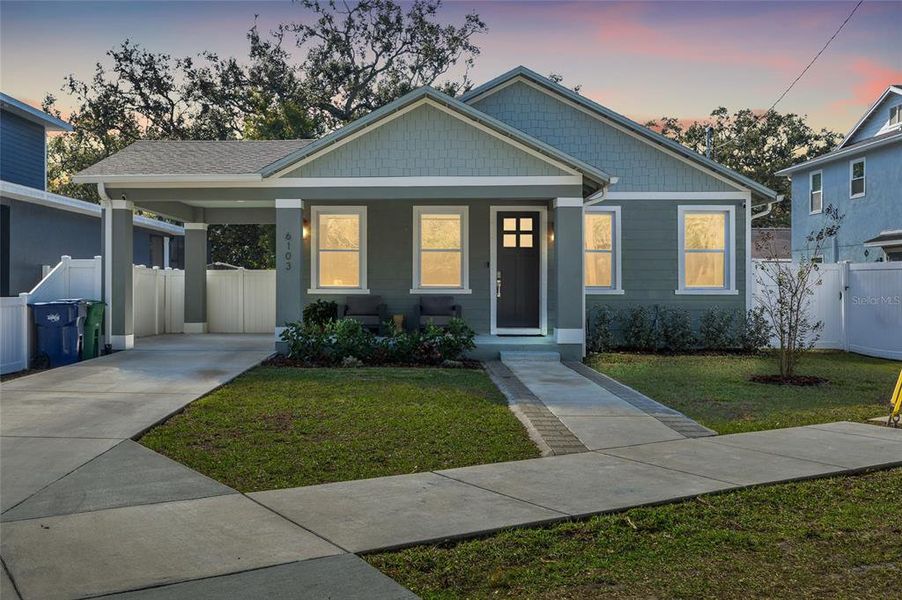 Front exterior of a new home in , Tampa, FL, highlighting curb appeal (Image 1). Front exterior of a new home in , Tampa, FL, highlighting curb appeal (Image 1).