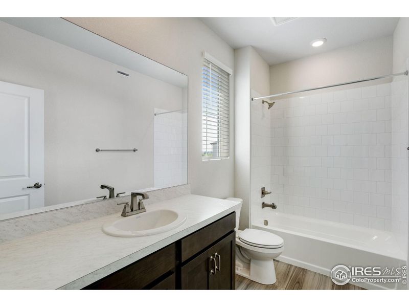Furnished interior view inside a new home in Westside Crossing Townhomes, Berthoud (Image 7).