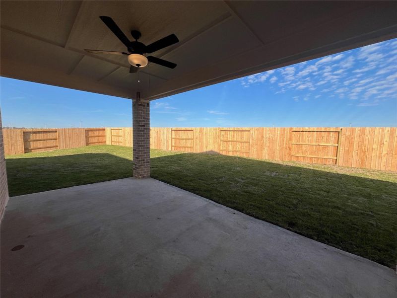 The spacious covered patio is perfect for outdoor entertaining.