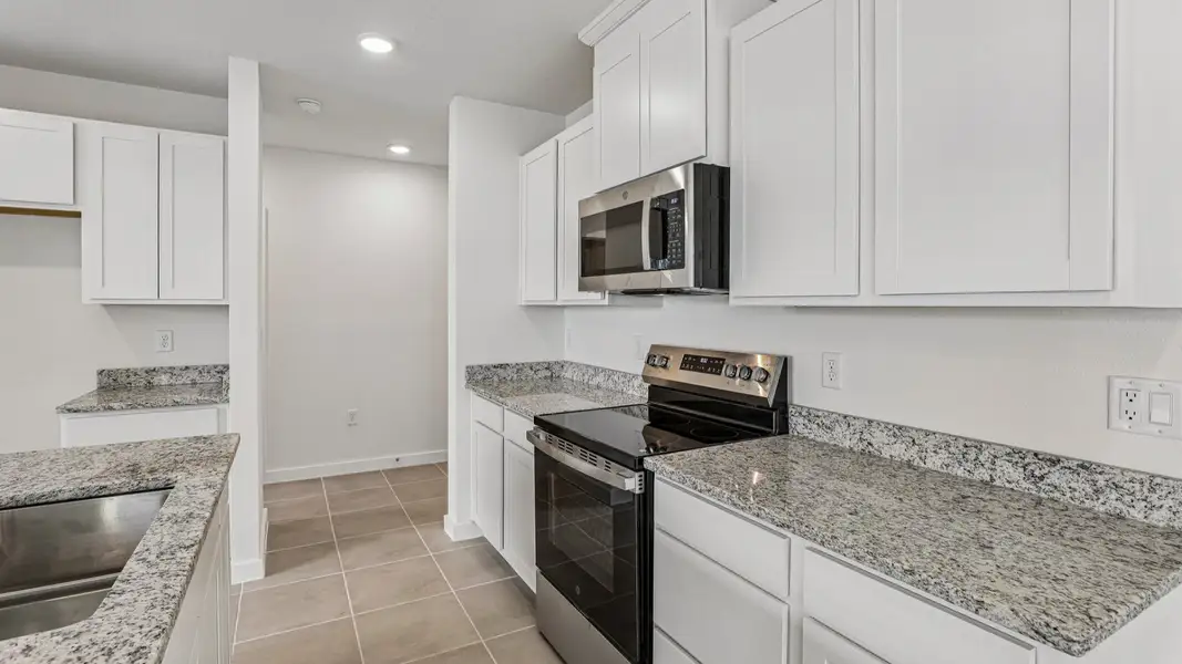 Furnished interior view inside a new home in Cyrene at Harmony, St. Cloud (Image 12).