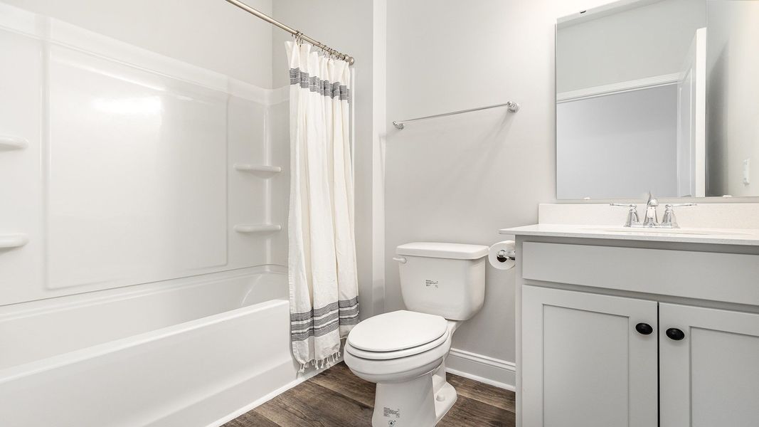 Furnished interior view inside a new home in Auberon Woods, Conway (Image 14).