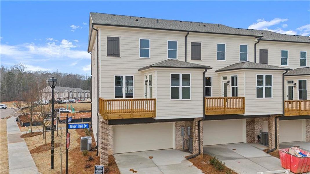 Exterior details and patio area of a home in Waterside Townhomes, Peachtree Corners (Image 18).