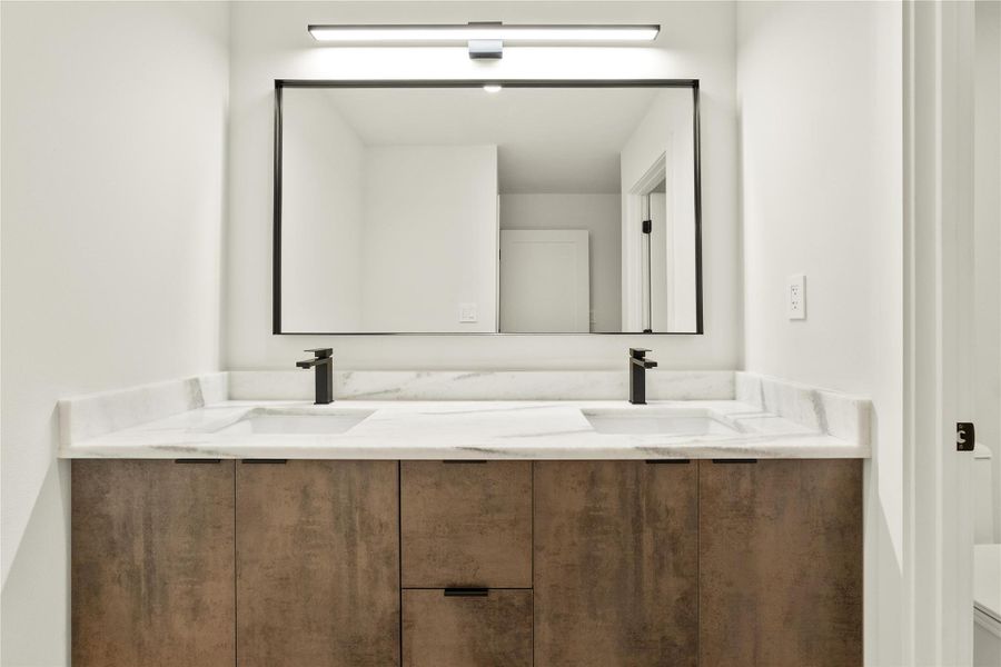 Full bathroom featuring double vanity