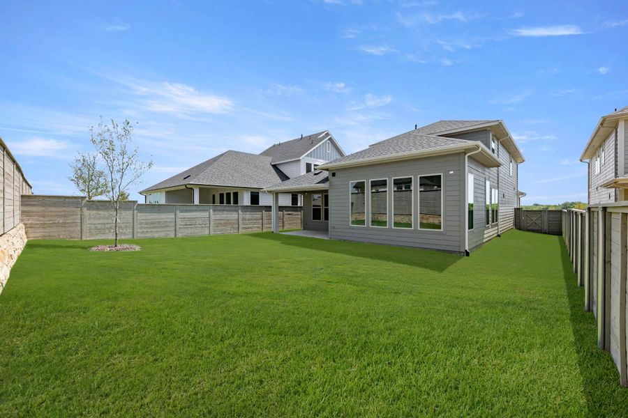 Front exterior of a new home in Treeline, Justin, TX, highlighting curb appeal (Image 18). Front exterior of a new home in Treeline, Justin, TX, highlighting curb appeal (Image 18).