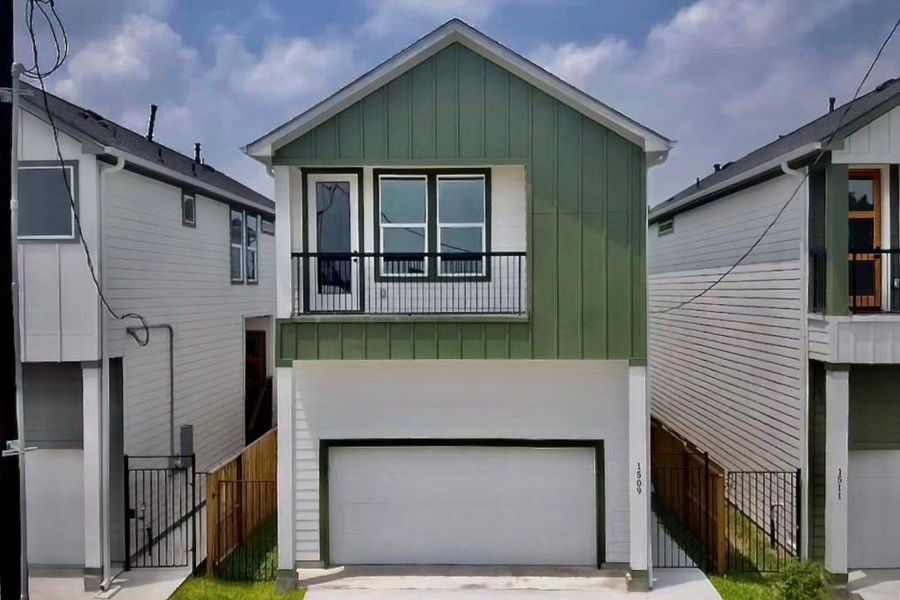 Modern two-story home with a two-car garage, private gated entry, and stylish curb appeal featuring a sleek green and white façade. Modern two-story home with a two-car garage, private gated entry, and stylish curb appeal featuring a sleek green and white façade.