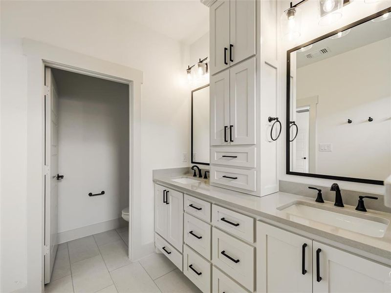 Dual vanities with sinks Dual vanities with sinks