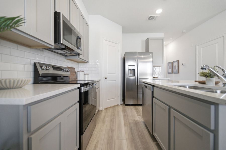 Representative furnished interior of a home built from the Mies by CastleRock Communities in Municipal Drive Townhomes, Leander (Image 18). Representative furnished interior of a home built from the Mies by CastleRock Communities in Municipal Drive Townhomes, Leander (Image 18).