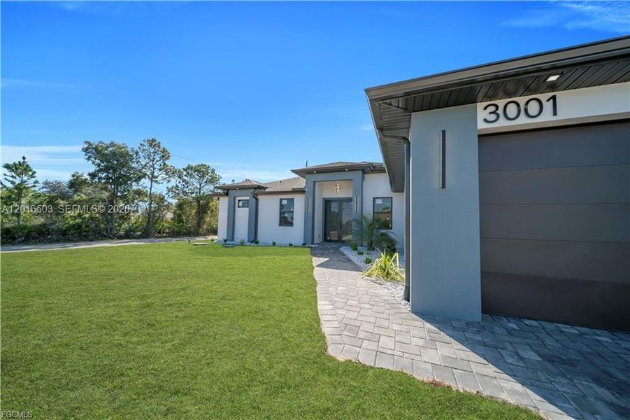 Exterior details and patio area of a home in , Lehigh Acres (Image 3).