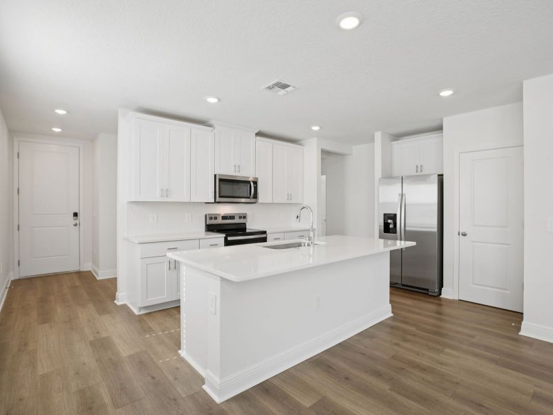 Furnished interior view inside a new home in The Reserve at Hammock Oaks - Classic Series, Lady Lake (Image 5).