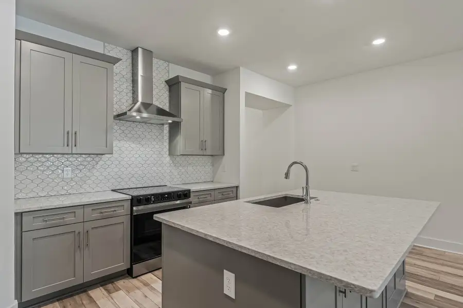 Furnished interior view inside a new home in Harvest at Ovation - Townhomes, Winter Garden (Image 6).
