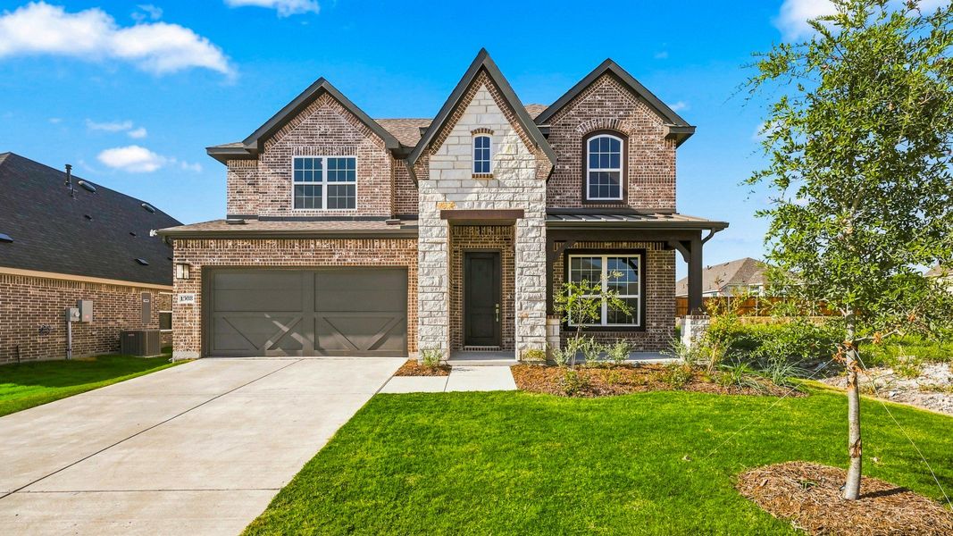 Front exterior of a new home in Anna Ranch, Anna, TX, highlighting curb appeal (Image 1). Front exterior of a new home in Anna Ranch, Anna, TX, highlighting curb appeal (Image 1).