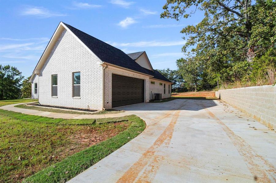 Exterior details and patio area of a home in , Lindale (Image 22).