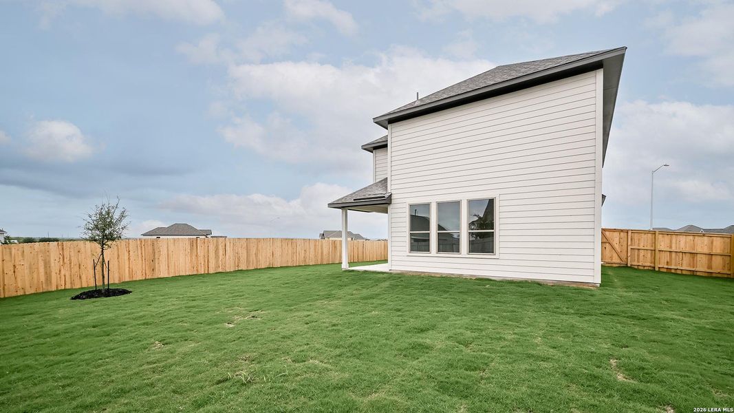 Exterior details and patio area of a home in The Parklands, Schertz (Image 4).