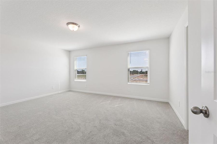 Spacious, unfurnished interior of a new home in Crosswinds - Signature Series, Haines City (Image 27).