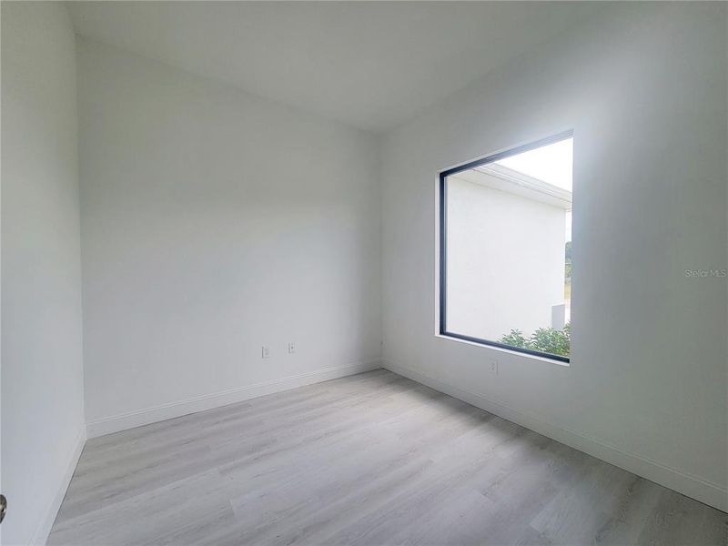 Spacious, unfurnished interior of a new home in , Punta Gorda (Image 28).