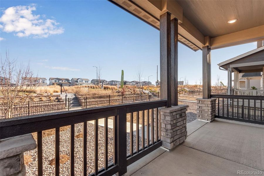 Exterior details and patio area of a home in Crescendo at The Aurora Highlands, Aurora (Image 33).