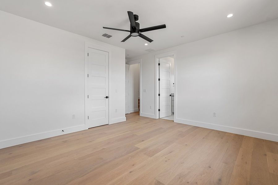 Spacious, unfurnished interior of a new home in Milky Way at River Place, Austin (Image 23).