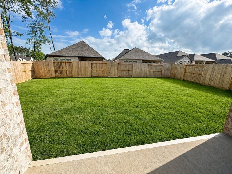 Exterior details and patio area of a home in The Highlands, Porter Heights (Image 2).