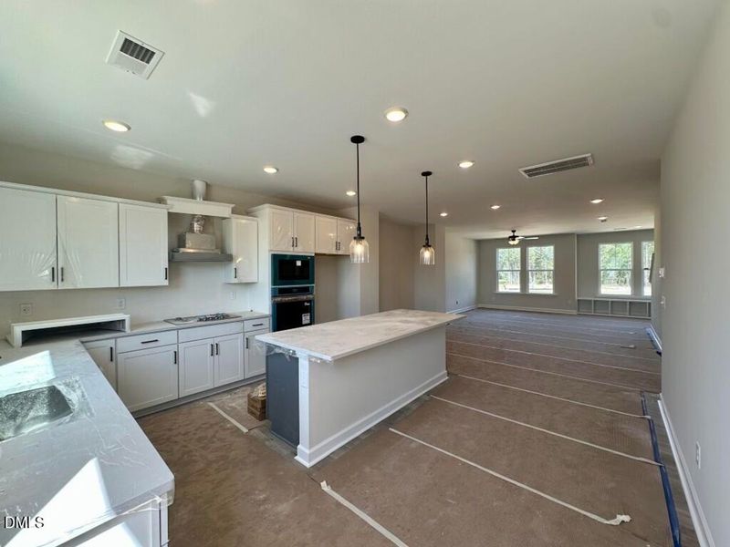 In-progress construction of a new home in Forestville Yard Townhomes, Knightdale, NC (Image 9).