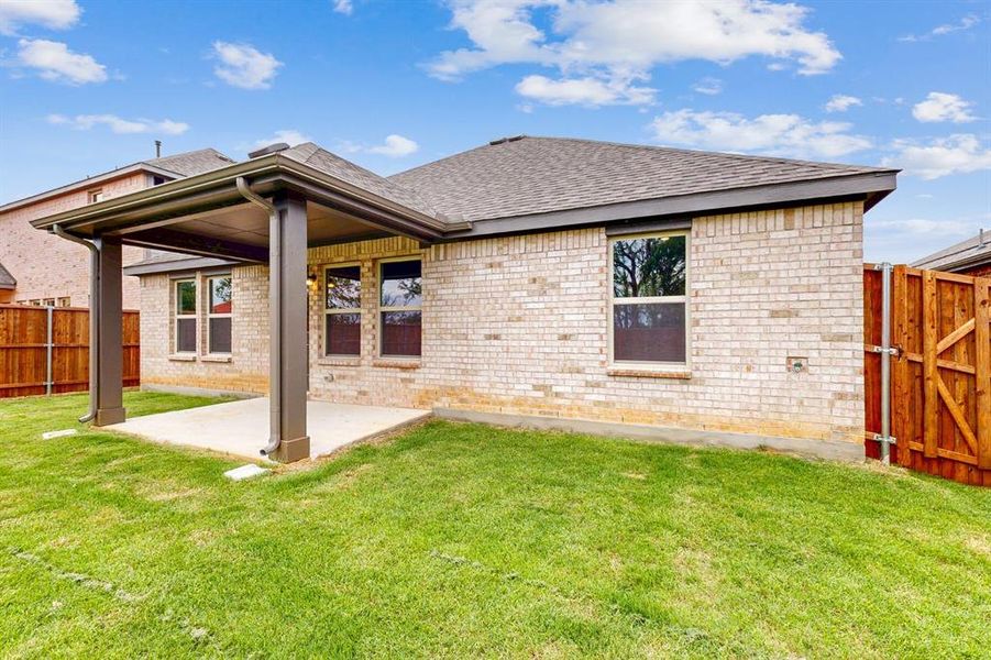 Front exterior of a new home in Kings Way, Denton, TX, highlighting curb appeal (Image 12).