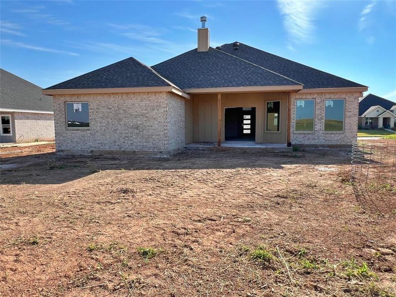 Front exterior of a new home in , Abilene, TX, highlighting curb appeal (Image 15).