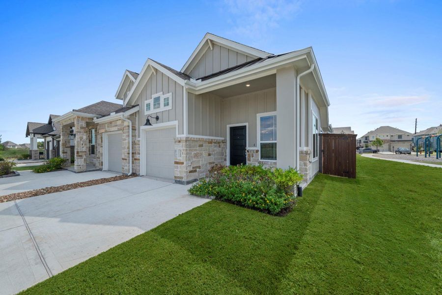 Exterior details and patio area of a home in Meridiana, Iowa Colony (Image 16).