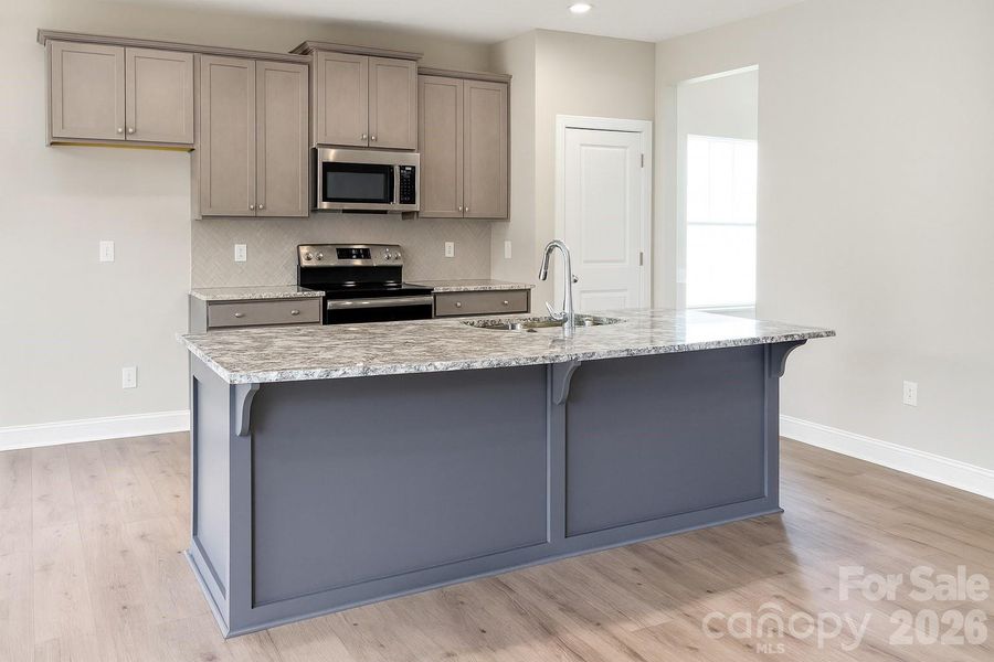 Furnished interior view inside a new home in , Concord (Image 5).