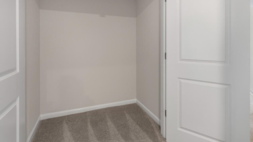 Spacious, unfurnished interior of a new home in The Willows at Blake Farm, Wilmington (Image 24).