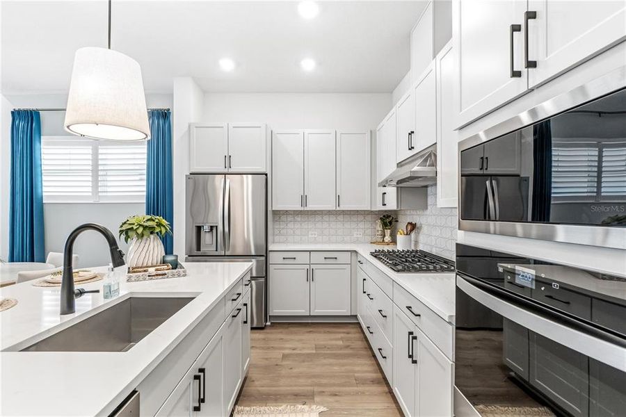 Furnished interior view inside a new home in Emerald Landing at Waterside at Lakewood Ranch – Cottage Series, Sarasota (Image 9). Furnished interior view inside a new home in Emerald Landing at Waterside at Lakewood Ranch – Cottage Series, Sarasota (Image 9).