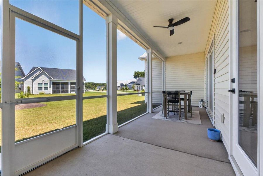Exterior details and patio area of a home in Summerwind Crossing at Lakes of Cane Bay, Summerville (Image 3).