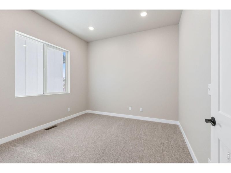 Spacious, unfurnished interior of a new home in Highlands Preserve, Mead (Image 16).