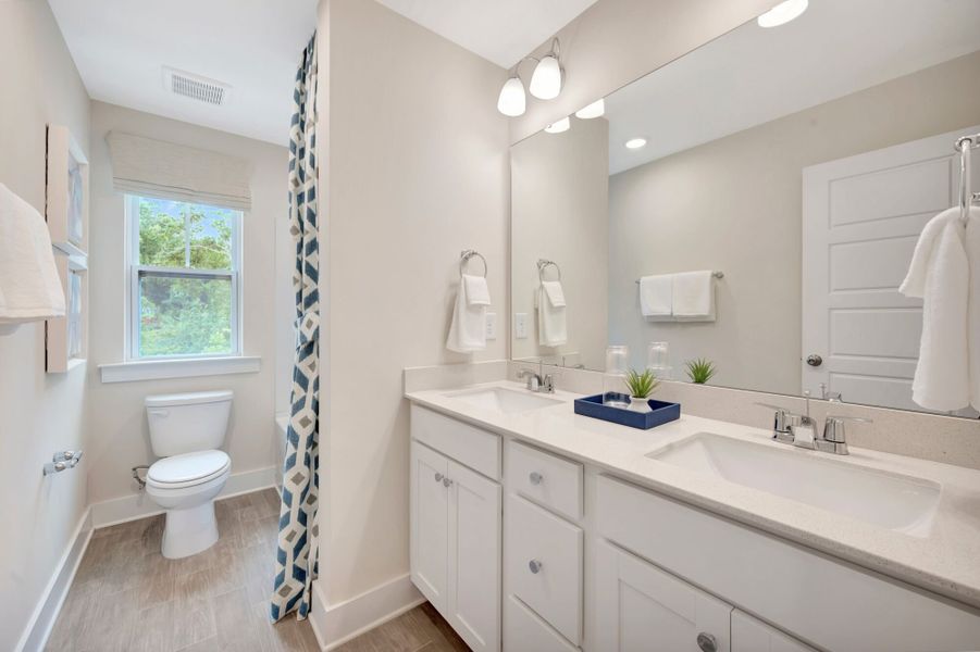 Representative furnished interior of a home built from the Vienna by Mattamy Homes in Ashmore Townes, Garner (Image 28).