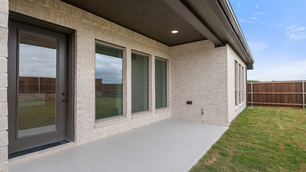Exterior details and patio area of a home in Meraki, Forney (Image 2).