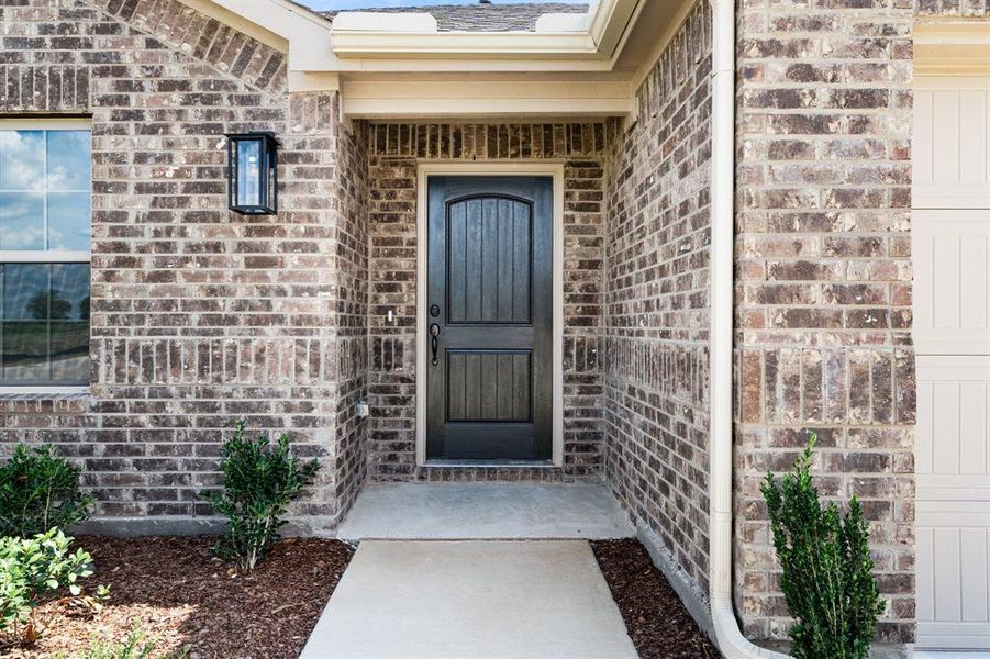 Exterior details and patio area of a home in Fox Landing, Caddo Mills (Image 4).