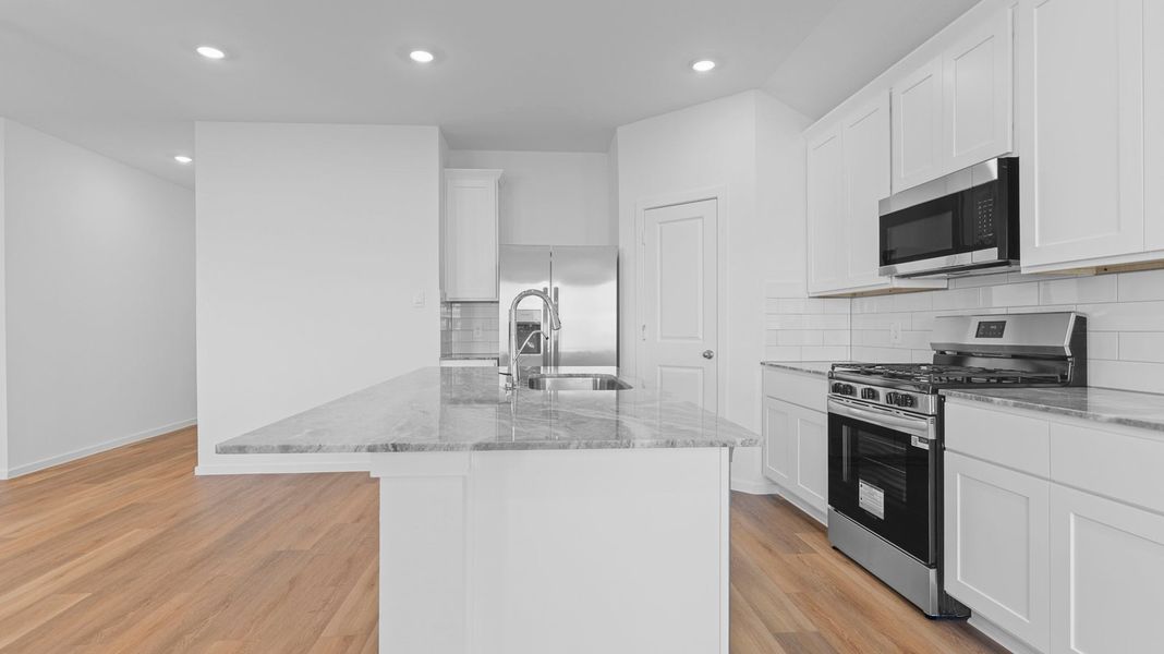Furnished interior view inside a new home in Watermark, Alvin (Image 4).