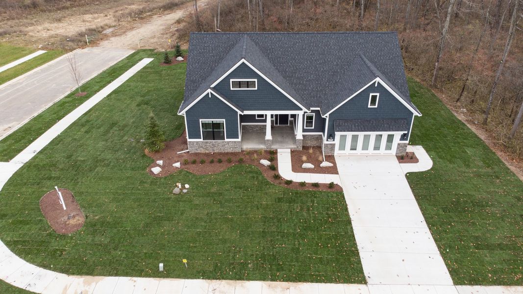 Front exterior of a new home in Preserve at Magnolia Park, Jackson, MI, highlighting curb appeal (Image 30).