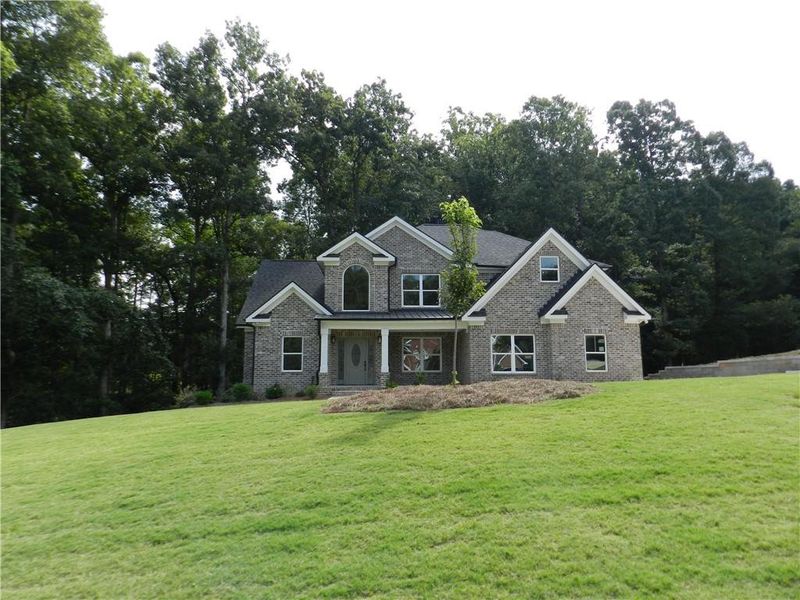Front exterior of a new home in , McDonough, GA, highlighting curb appeal (Image 22).