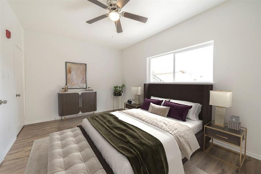 Virtually Staged* Bedroom featuring hardwood / wood-style flooring and ceiling fan