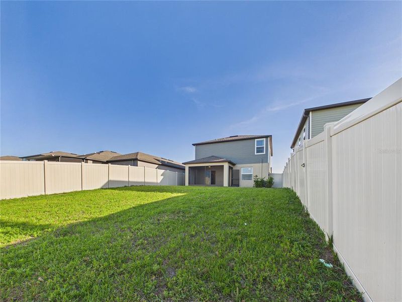 Exterior details and patio area of a home in Two Rivers, Zephyrhills (Image 27).