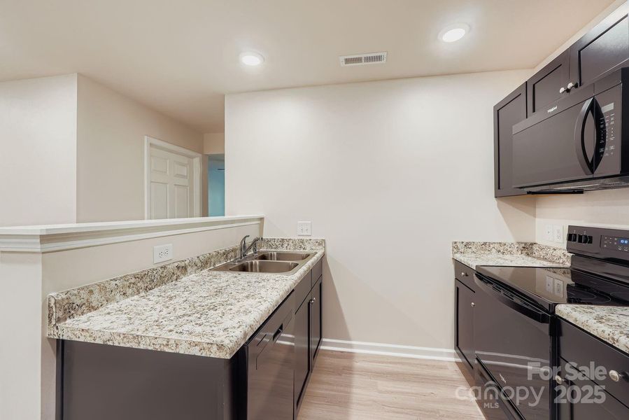 Furnished interior view inside a new home in , Charlotte (Image 8). Furnished interior view inside a new home in , Charlotte (Image 8).