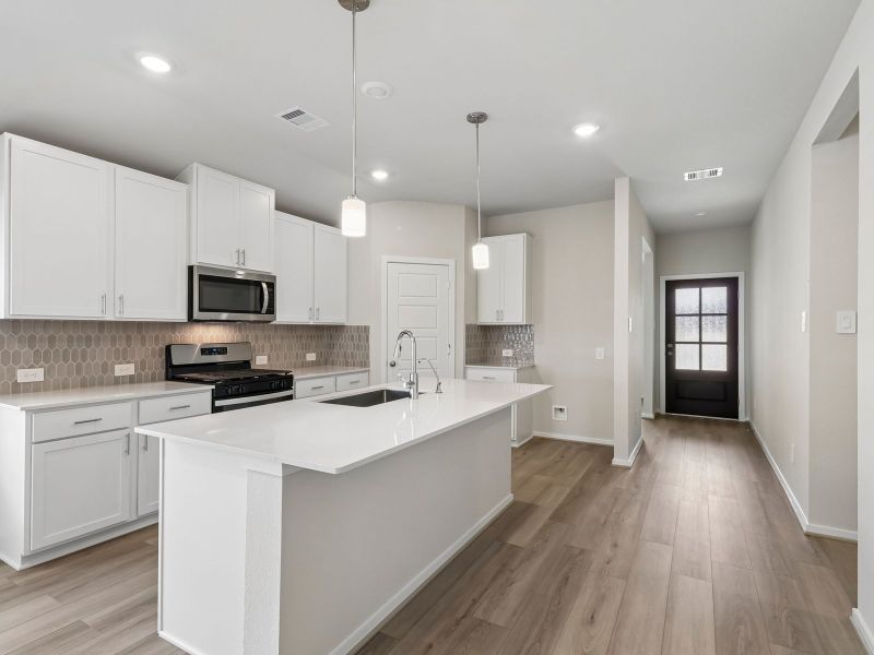 Furnished interior view inside a new home in Riviera Pines - Premier Series, Huffman (Image 4).