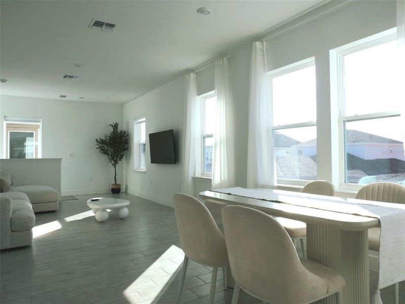 Furnished interior view inside a new home in Laureate Park, Orlando (Image 7).