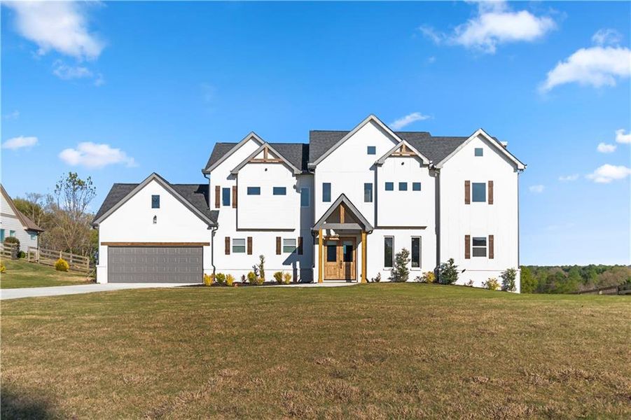 Front exterior of a new home in , Clermont, GA, highlighting curb appeal (Image 24). Front exterior of a new home in , Clermont, GA, highlighting curb appeal (Image 24).