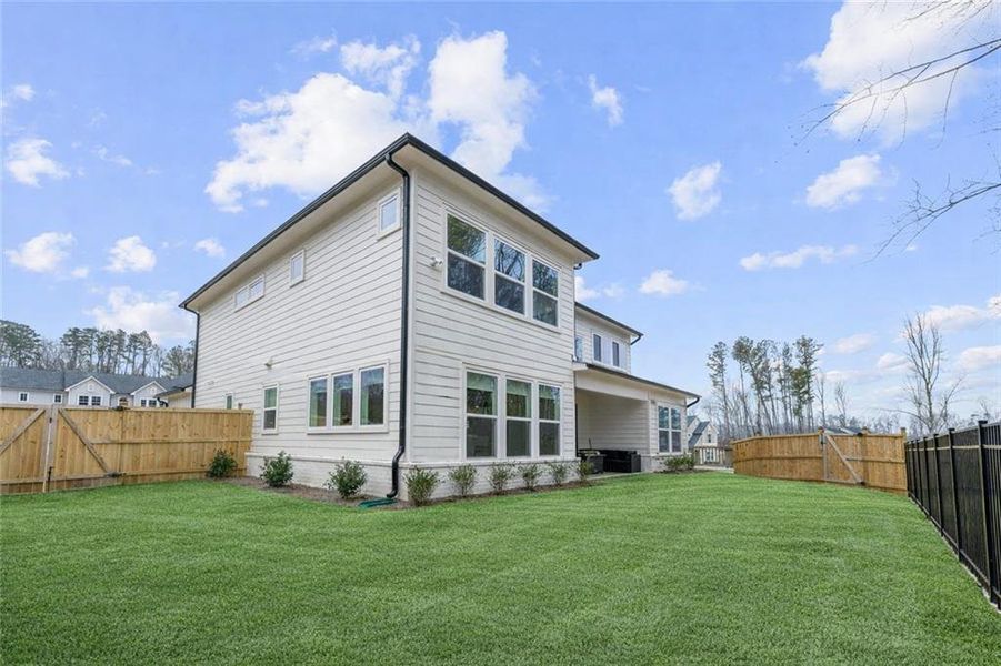 Exterior details and patio area of a home in Settingdown Farms, Cumming (Image 4).