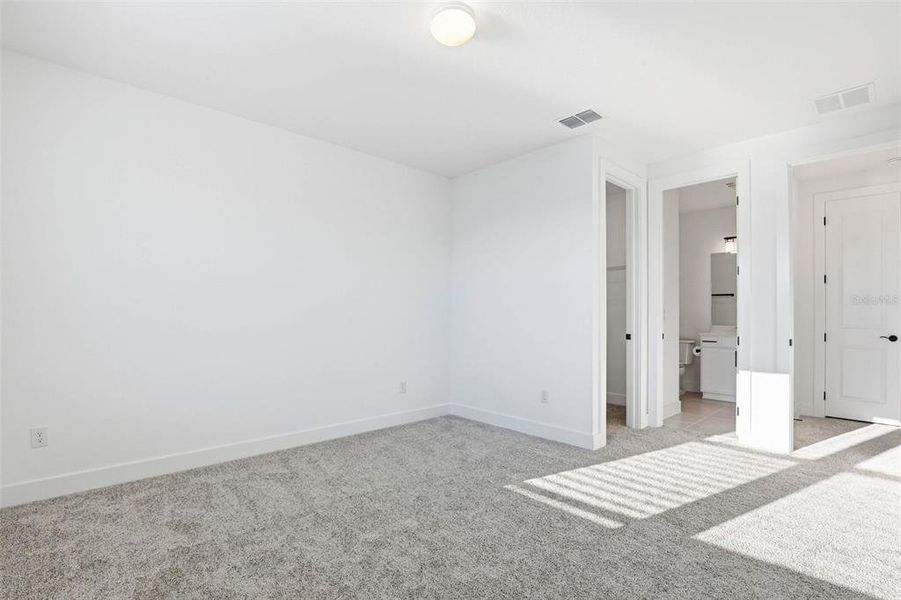 Spacious, unfurnished interior of a new home in Vida's Way, Wesley Chapel (Image 64).